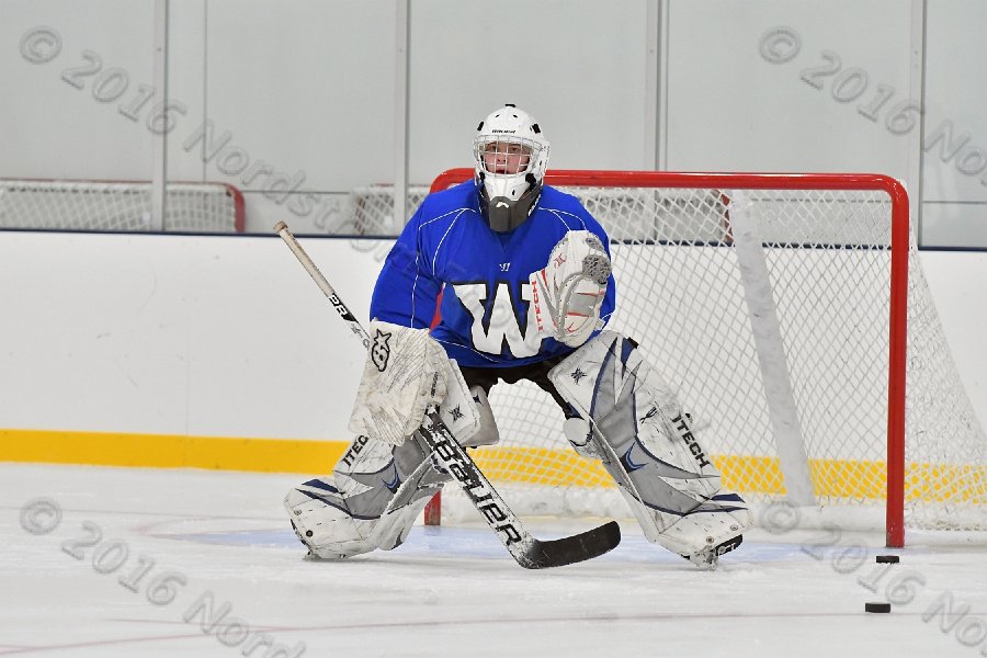 Wheaton College Men\'s Ice Hockey vs Middlesex Community College. - Photo By: KEITH NORDSTROM
